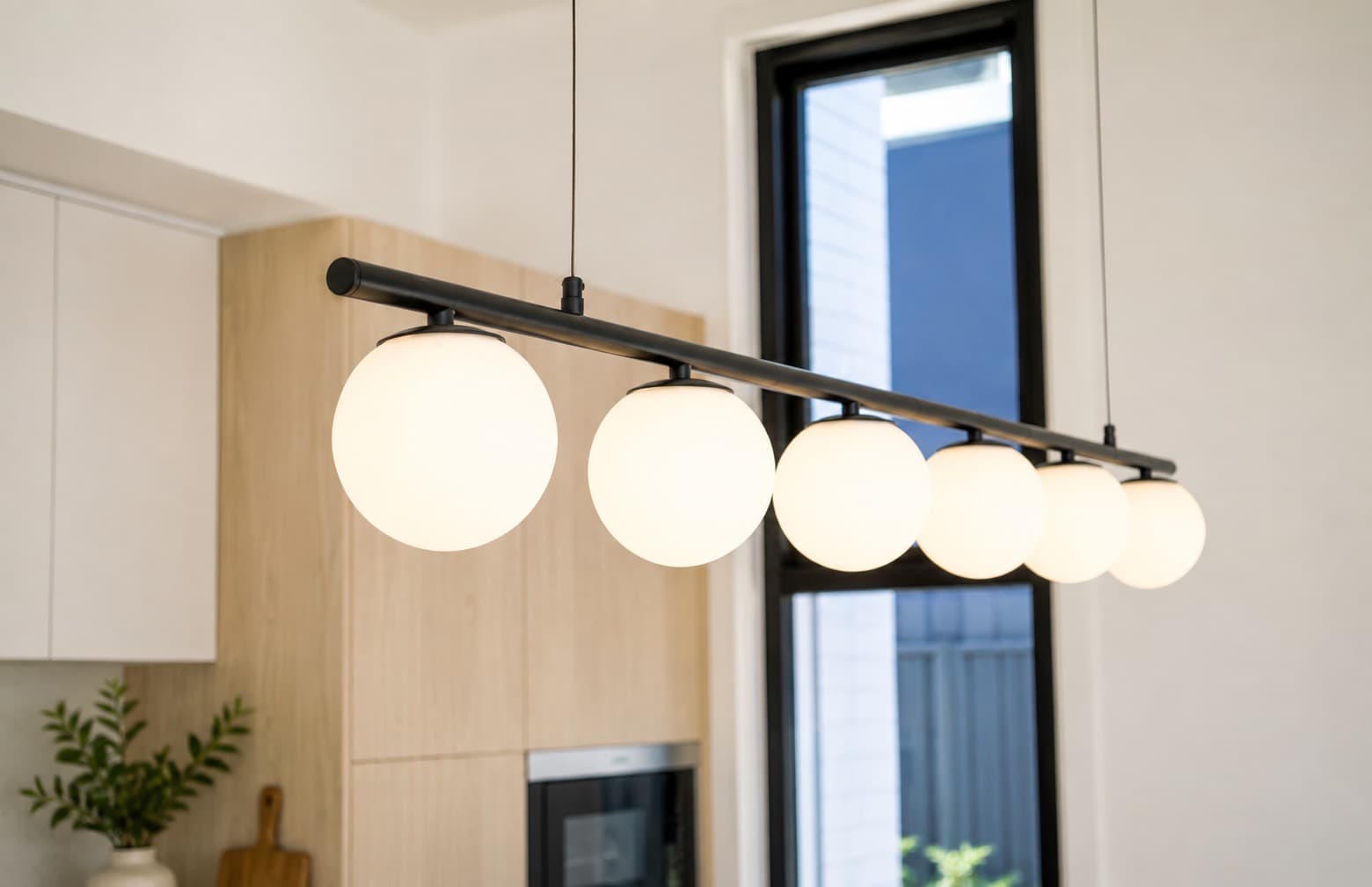 Feature pendant lighting above the kitchen island