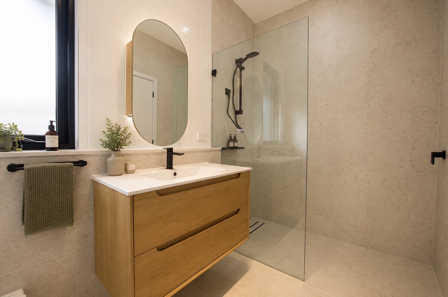 Bathroom with timber vanity and walk-in shower